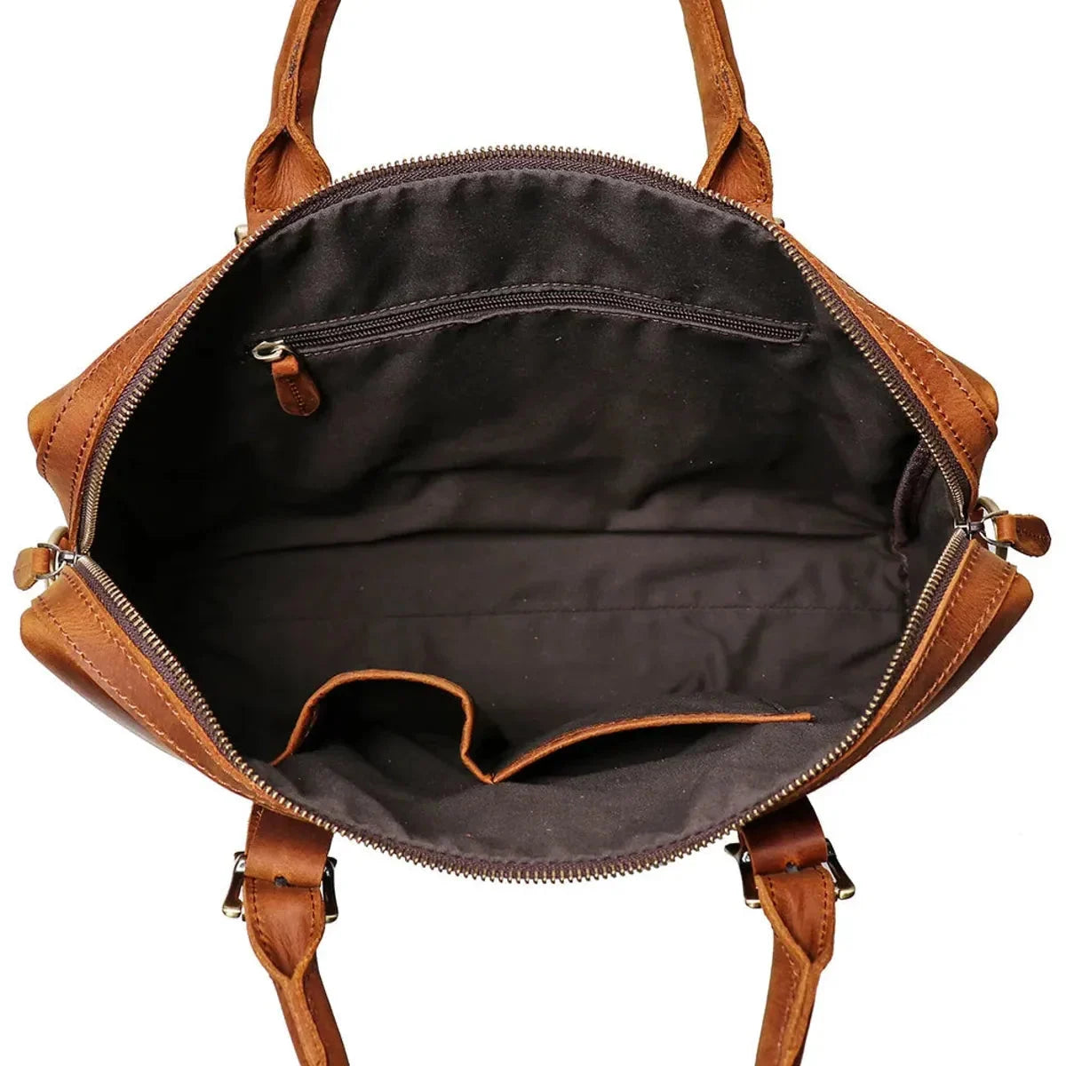 Porte-documents ouvert contenant ordinateur, documents et accessoires