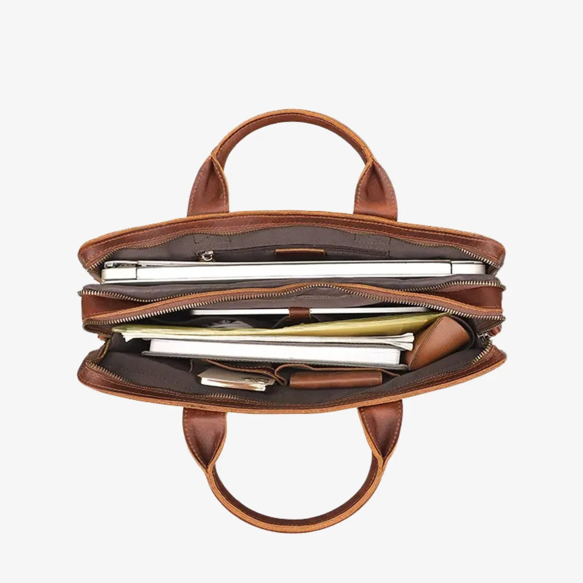 Porte-documents en cuir ouvert vu de dessus avec ordinateur et documents visibles